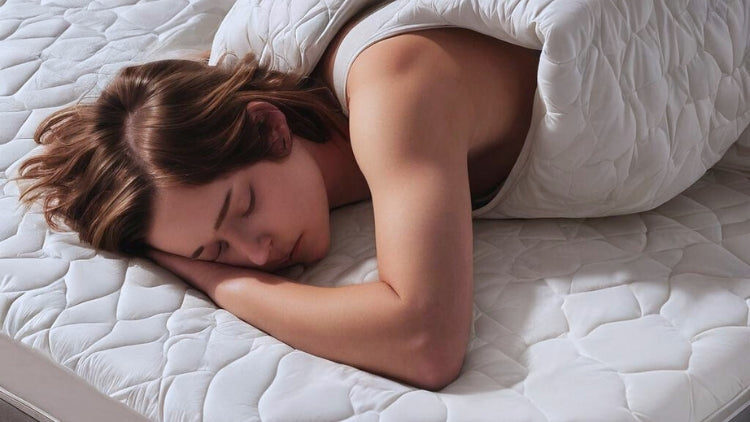 women sleeping in waterproof mattress header